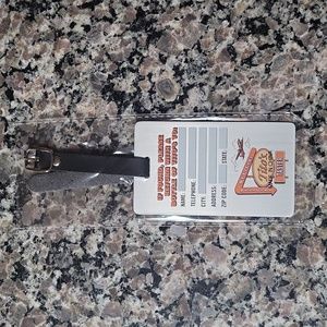 TITO'S Luggage Tag New Metal states if found, please return with a bottle of Tit